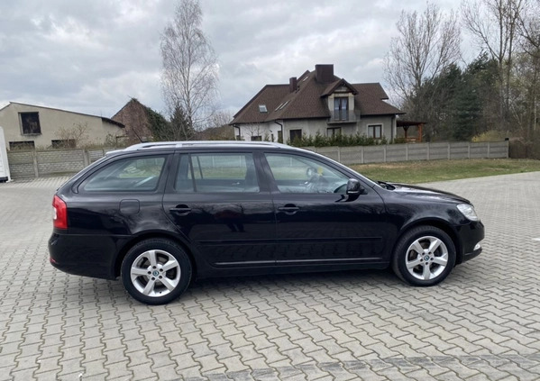 Skoda Octavia cena 28900 przebieg: 212000, rok produkcji 2011 z Poręba małe 254